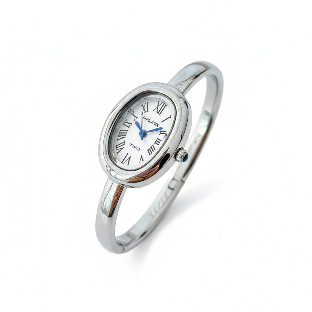 Reloj elegante para mujer AriasCreative con diseño ovalado, pulsera de aleación y cristales brillantes.