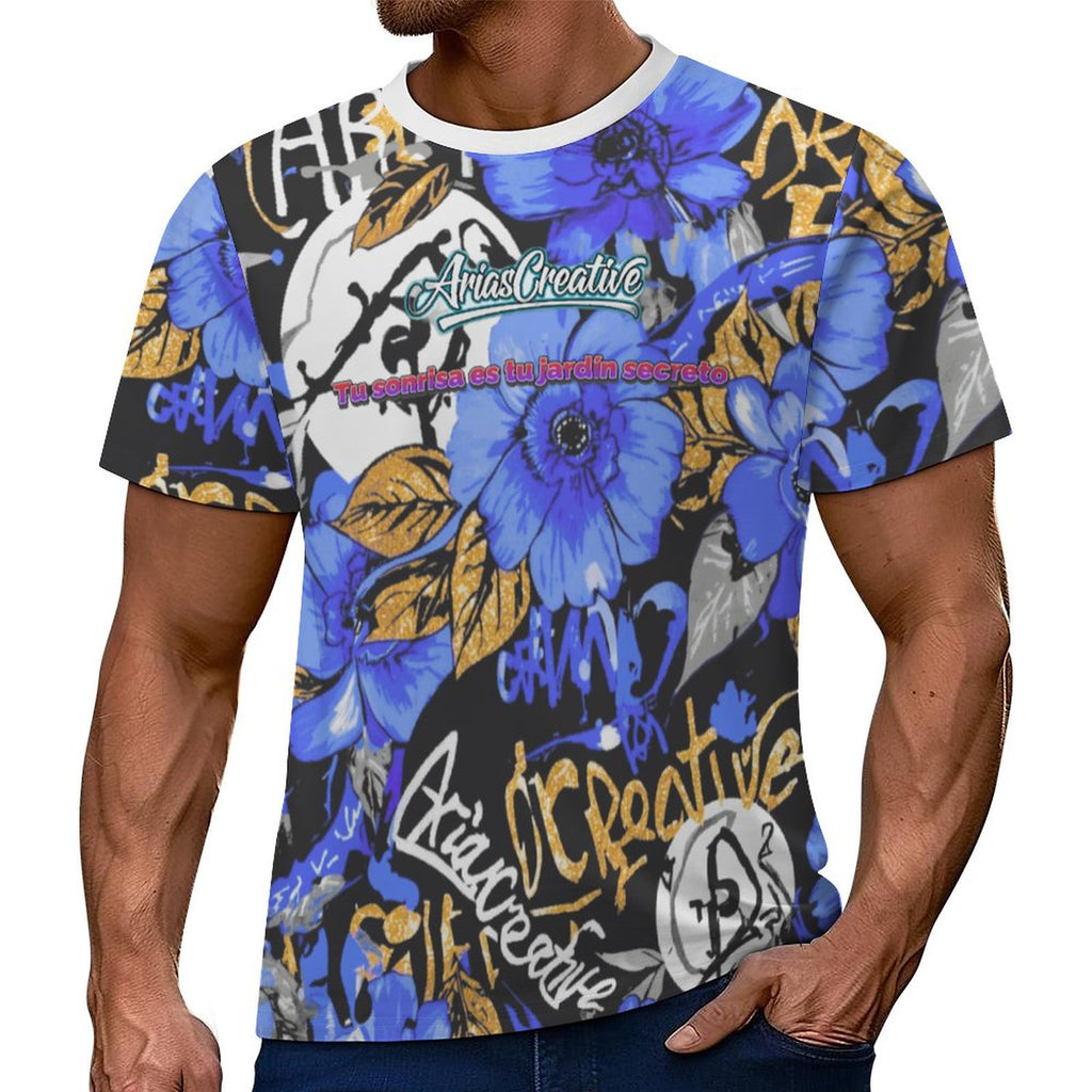 Camiseta manga corta AriasCreative con frase "Tu Sonrisa es tu Jardín Secreto" en diseño colorido y moderno.