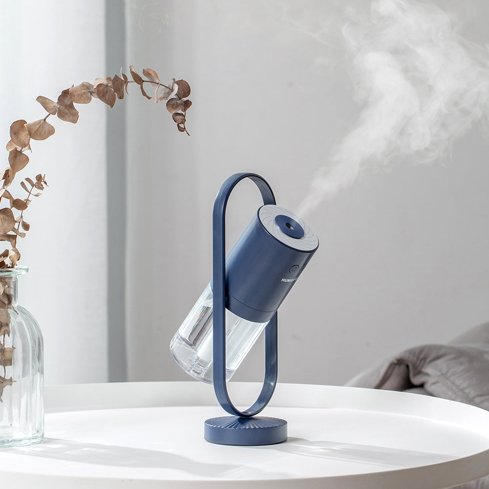 Humidificador ultrasónico USB AriasCreative con luz nocturna y proyector de sombras en color blanco para dormitorio, oficina o coche.