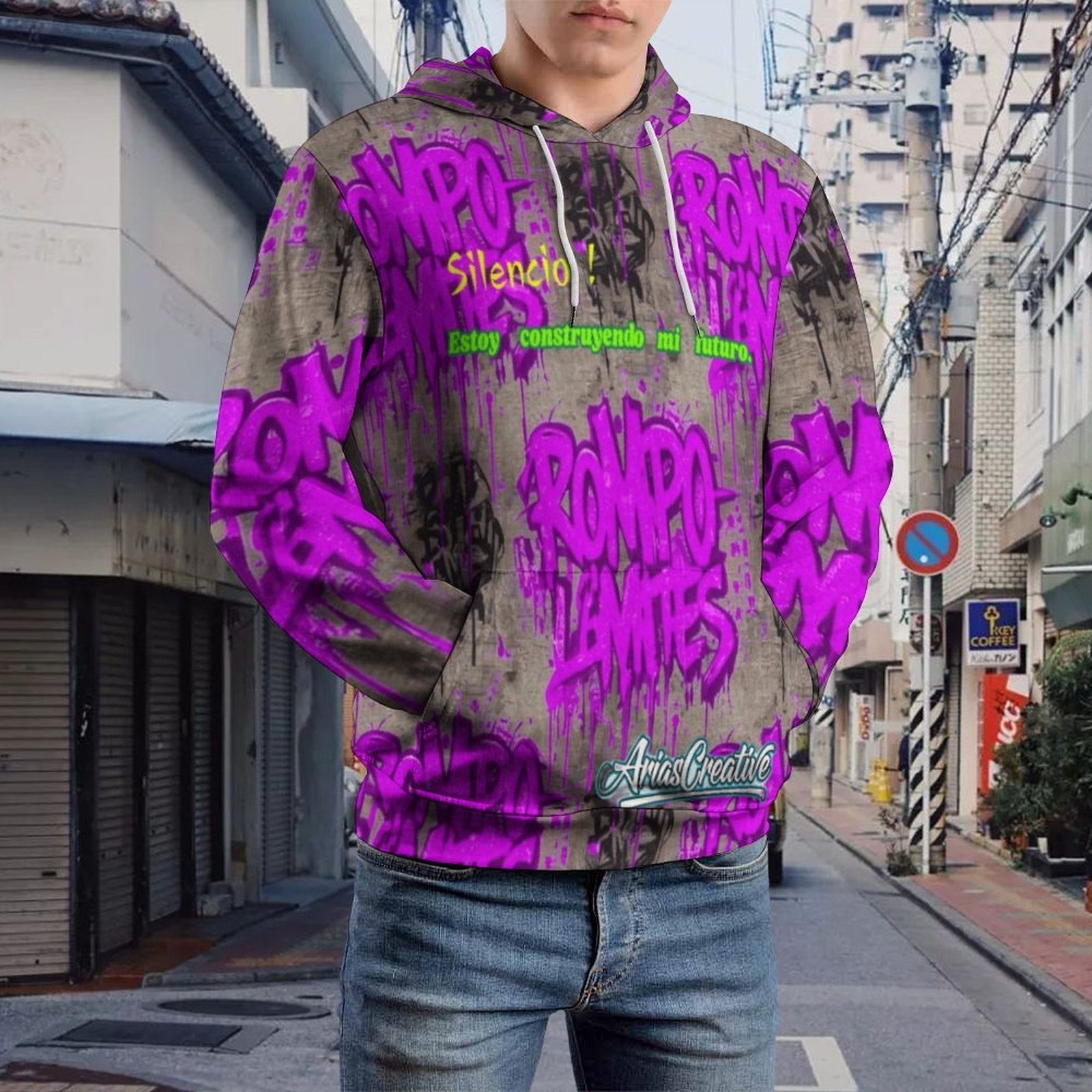 Sudadera con capucha AriasCreative "ROMPO MIS LÍMITES" en rosa y gris brillante con patrón graffiti, estilo moderno y atrevido.