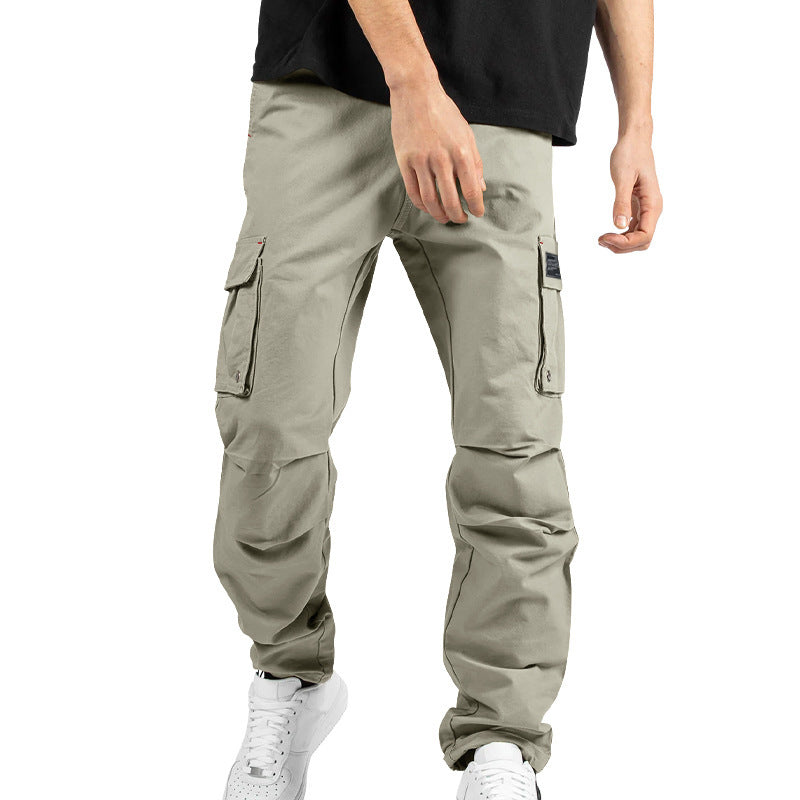 Pantalones cargo holgados de hombre en color liso con múltiples bolsillos y puños con cordón, marca AriasCreative.