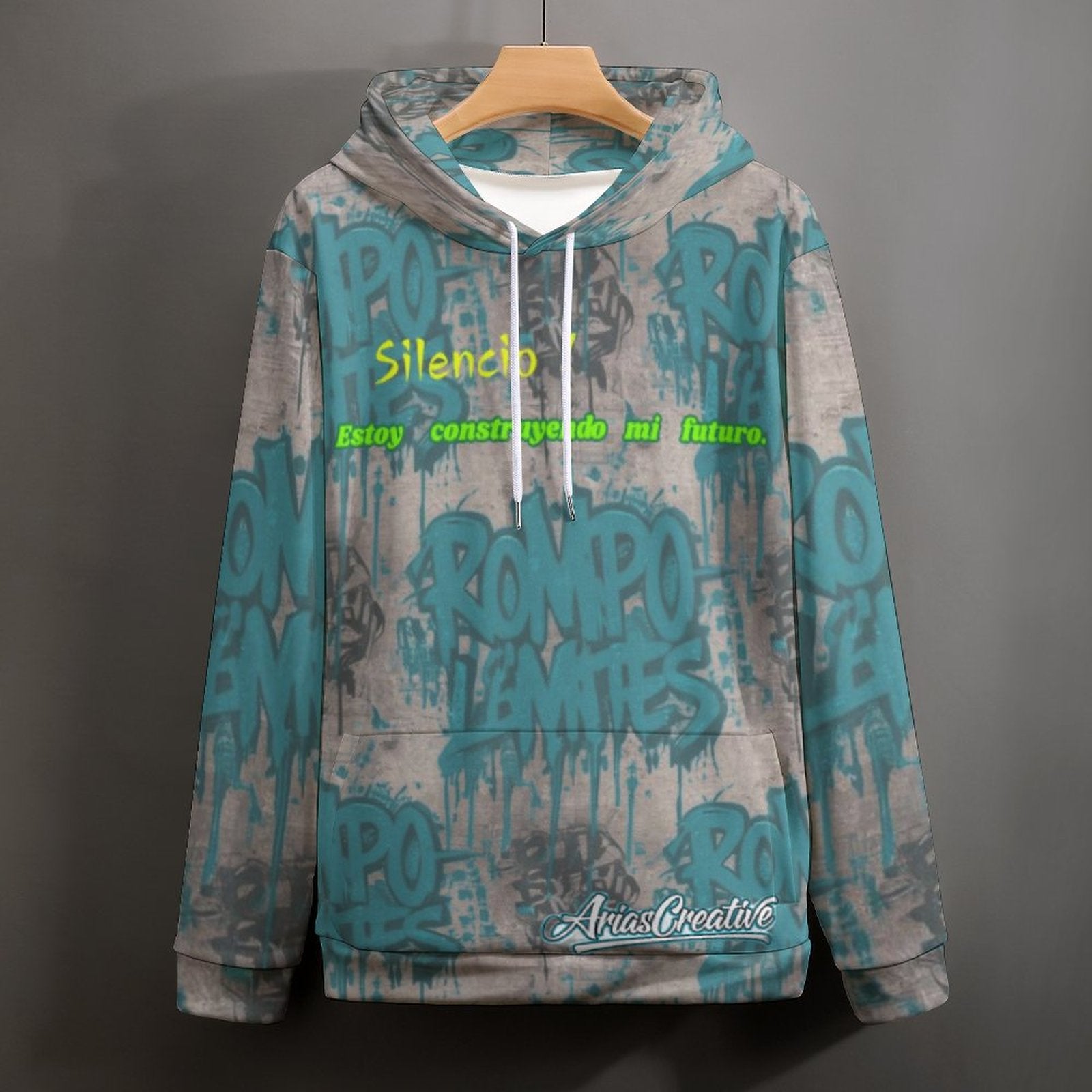 Sudadera con capucha Peaprint "ROMPO MIS LÍMITES" de AriasCreative, streetwear urbano premium, en color gris con diseño impreso.