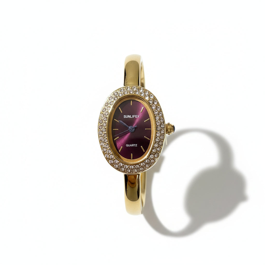 Reloj elegante para mujer AriasCreative con diseño ovalado y pulsera de aleación, adornado con cristales brillantes.