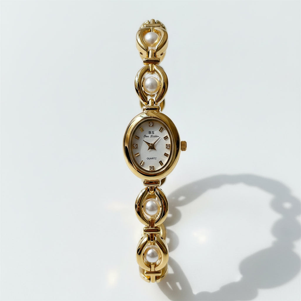 Reloj elegante de mujer AriasCreative con pulsera de perlas y diseño de cadena, grosor 9 mm, estilo sofisticado.